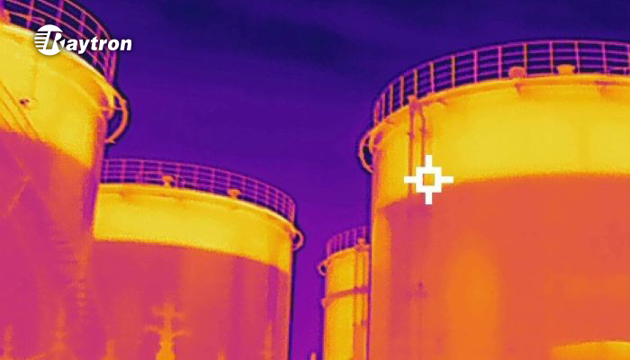Infrared thermal image of oil storage tanks showing temperature distribution and liquid level line captured by Raytron thermal camera Infrared thermal image of oil storage tanks showing temperature distribution and liquid level line captured by Raytron thermal camera